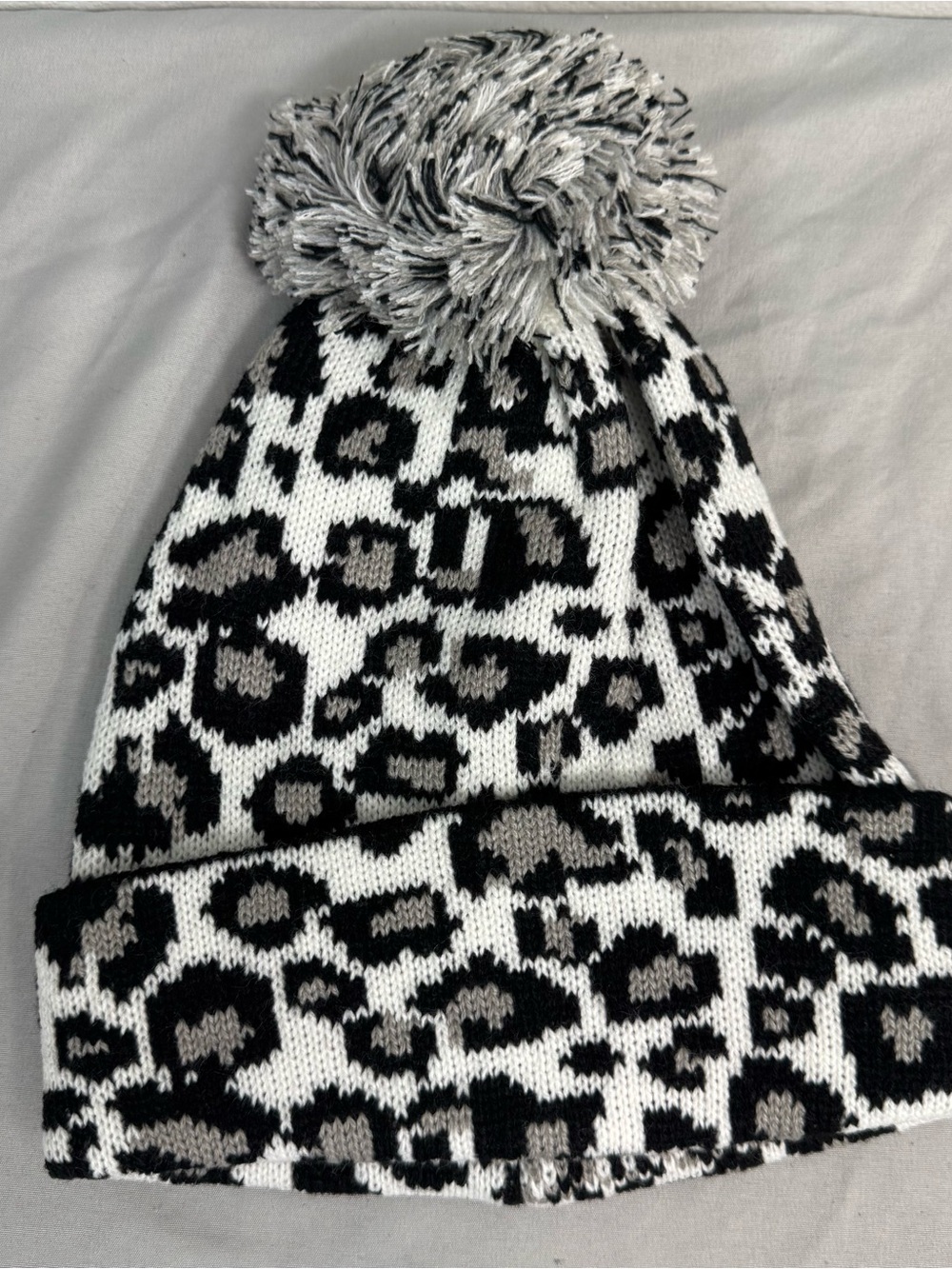 Leopard Print Pom Beanie in Black, White & Gray
New in bag, never worn